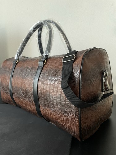 Braune reisetasche mit - reisetasche,